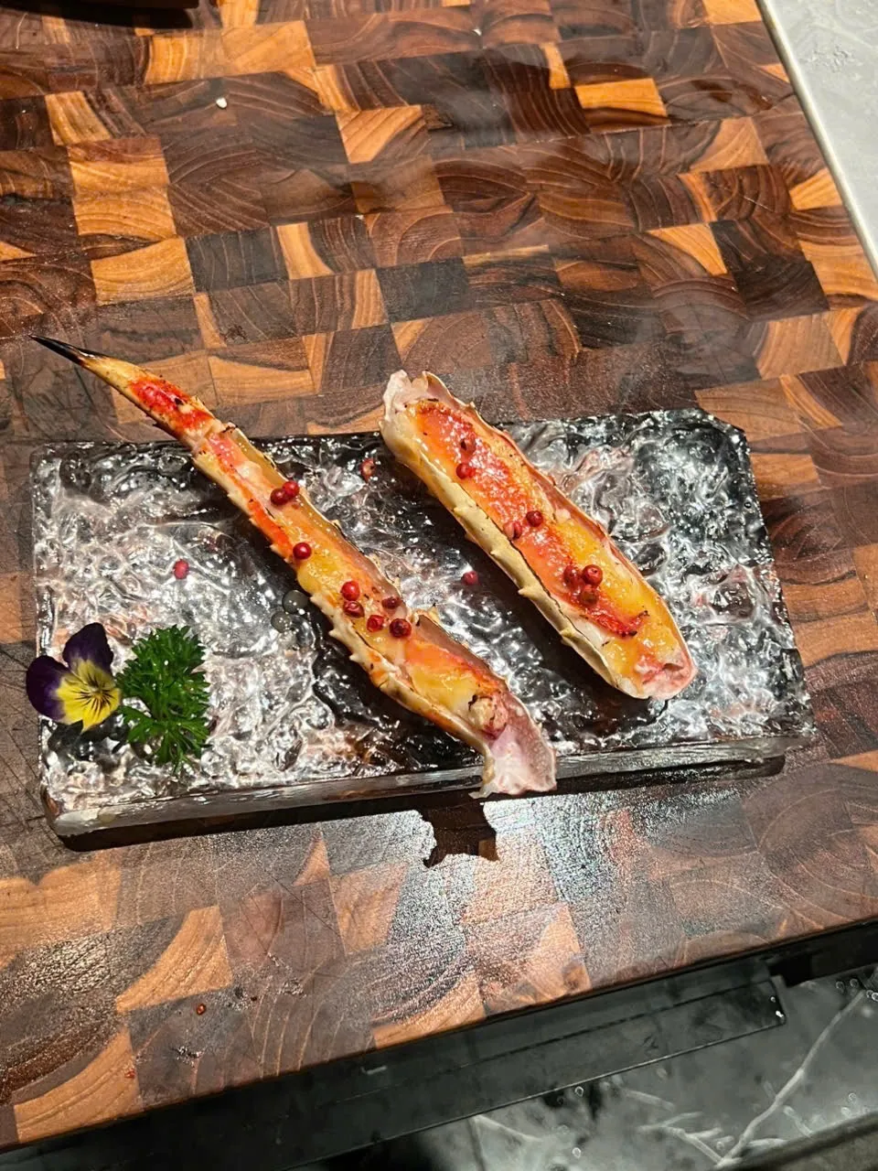 A finished king crab leg course at THE GU